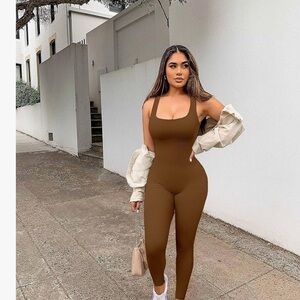 Stylish Brown Jumpsuit for Women never worn. Fits like S